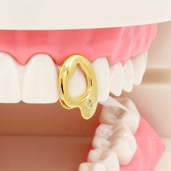 GOLD GRILLZ SINGLE OPEN FANG