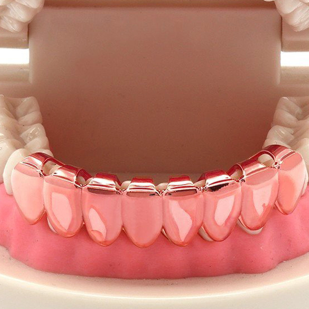 ROSE GOLD BOTTOM GRILLZ 8 TOOTH