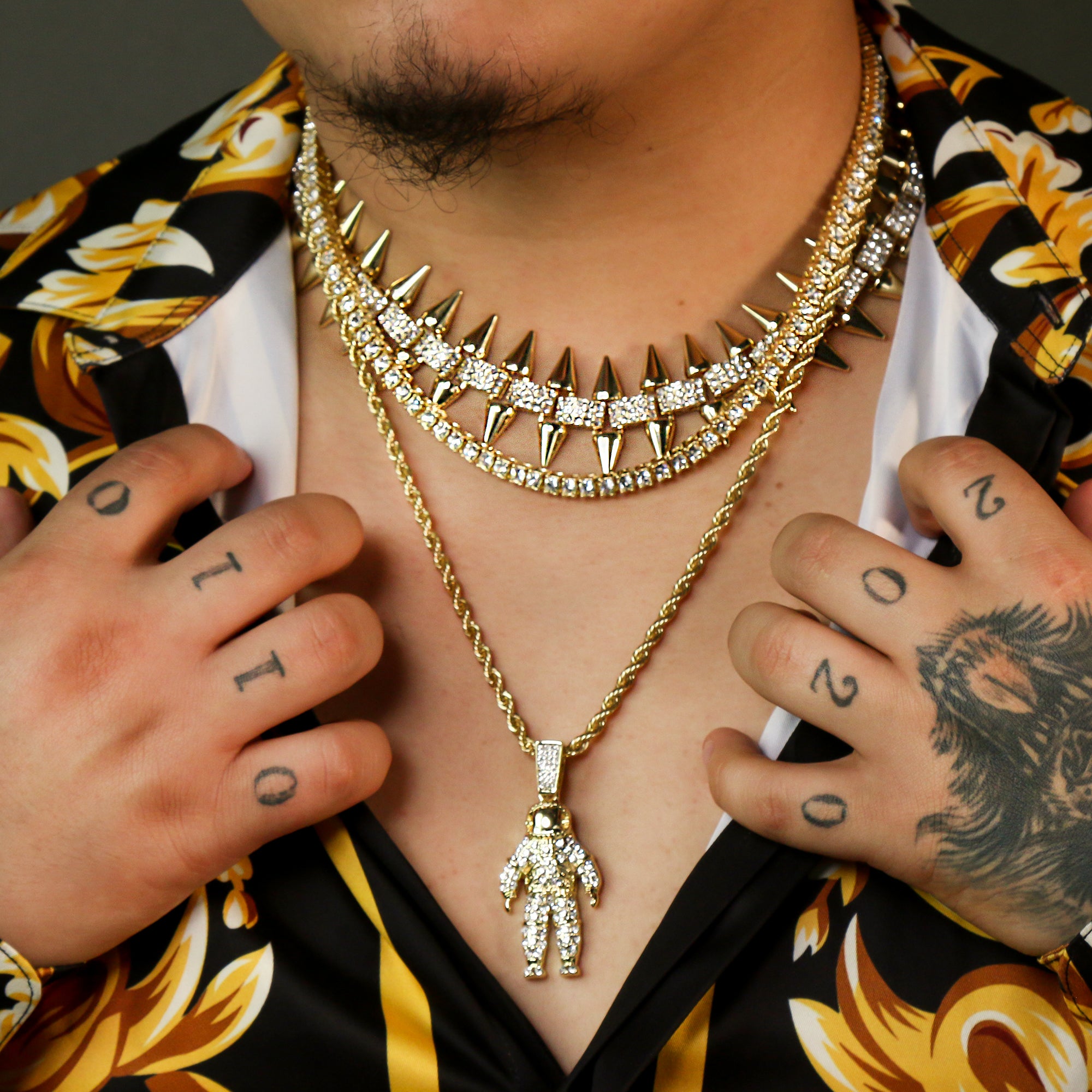 High Fashion Gold Plated AAA Spiky Tennis Chains & Cz Space Man Astronaut Pendant